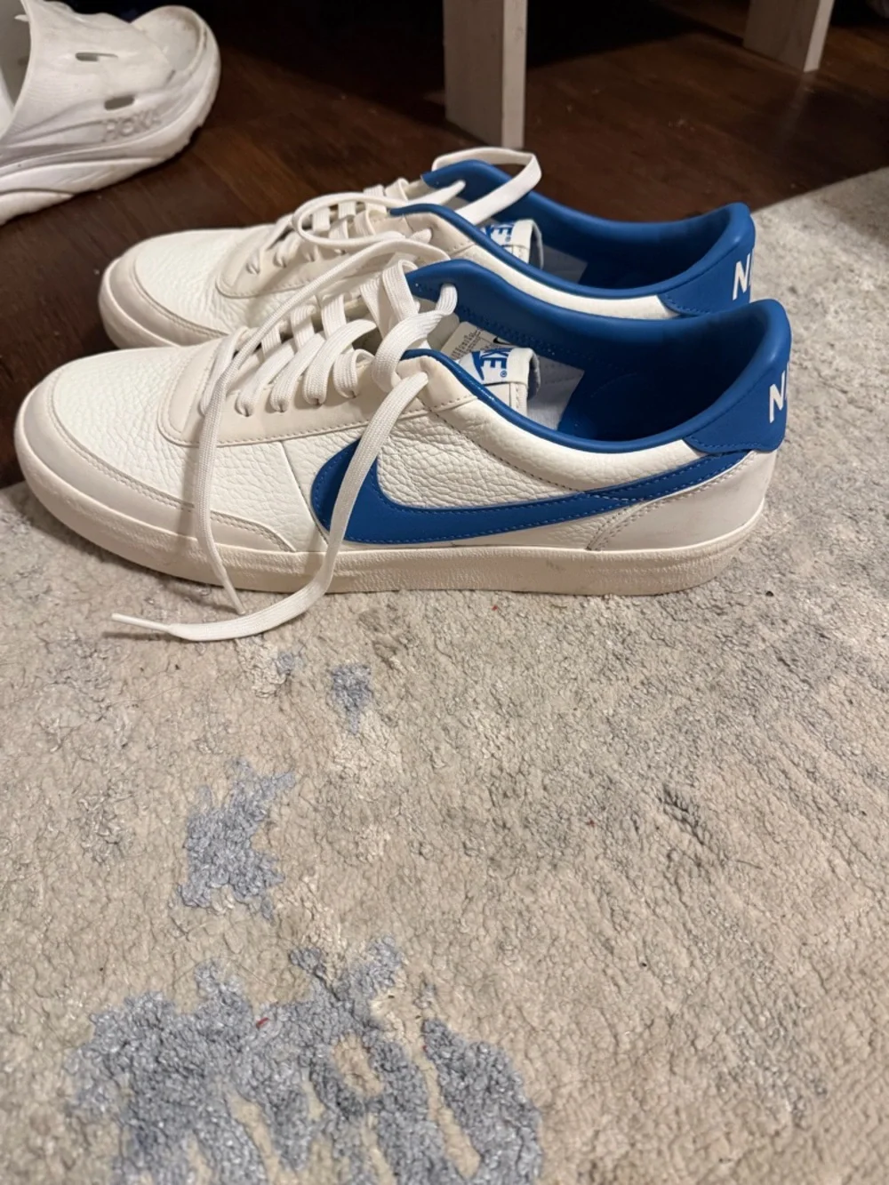 Nike White Leather Sneakers with Blue Swoosh - Picture 1 of 4
